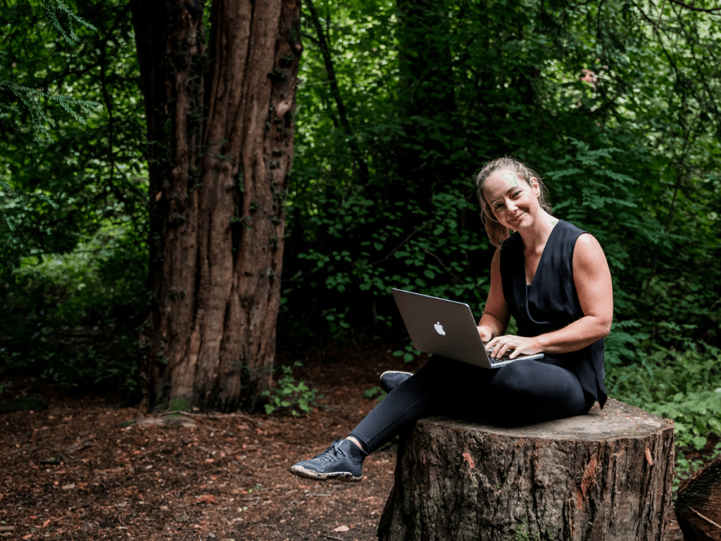 Diane Lillis, personal trainer from Move With Diane, working with coaching clients on her laptop